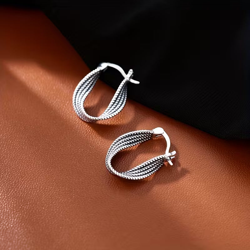 Twisted Silhouette Elegance Hoops