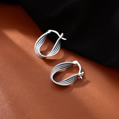 Twisted Silhouette Elegance Hoops