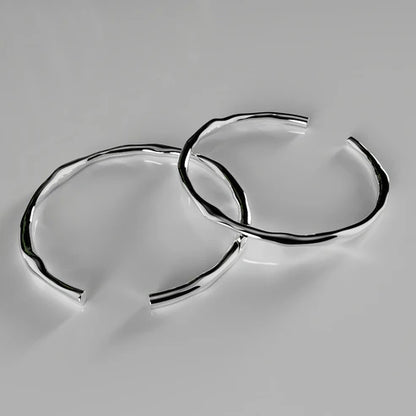Silver bracelet, adjustable and irregular in shape
