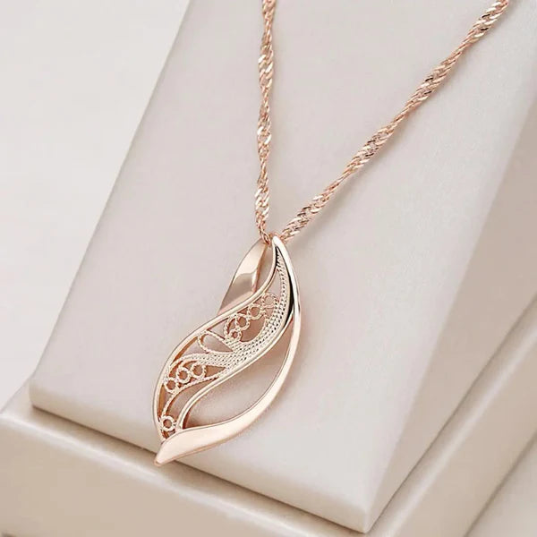 1+1 Offer: Elegant earrings with dark blue crystal in gold + Elegant Harmonious Necklace in Gold