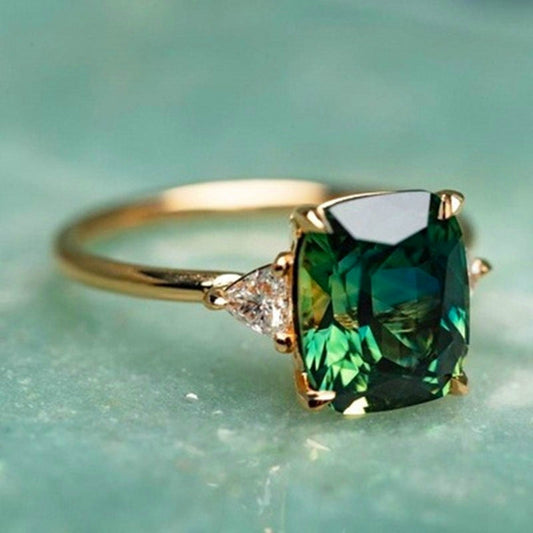 Gold cushion solitaire ring