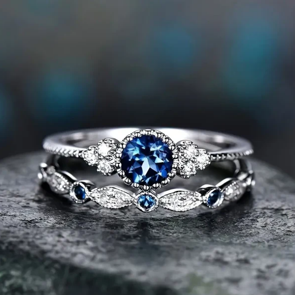 Silver sapphire halo ring