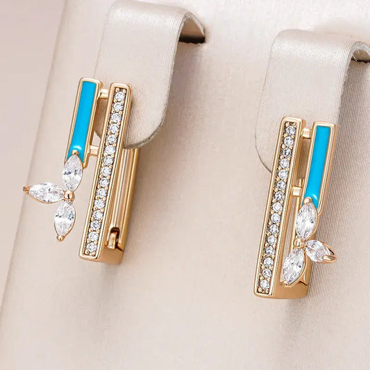 Elegant earrings with blue enamel and zirconia in gold