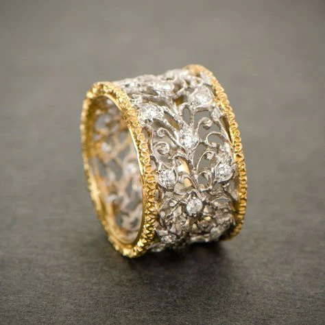 Silver and gold ornate band ring